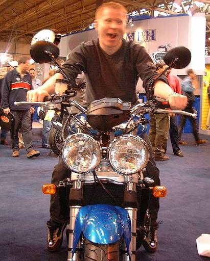 bikeshow2001-012.jpg - Jon on Speed Triple. The bug eye headlights are still there, and the blue is still more tasteful than Nuclear 'Red'.
